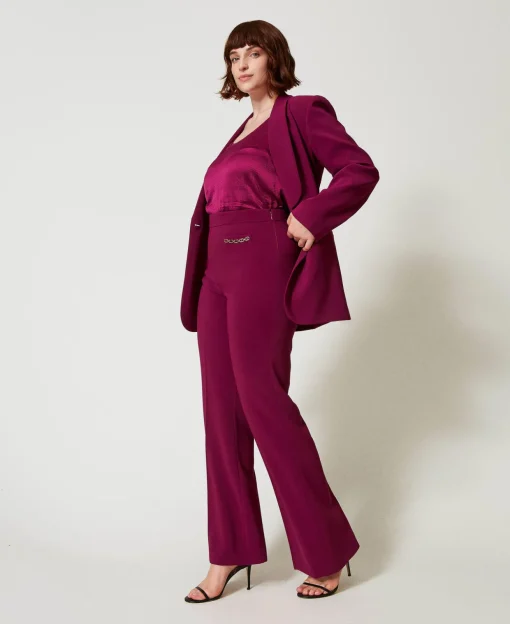 Pantaloni Flare Con Catena Oval T